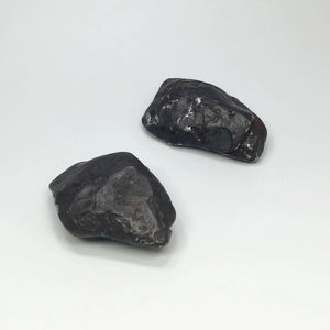 Two Uruacu Meteorites on a White Background