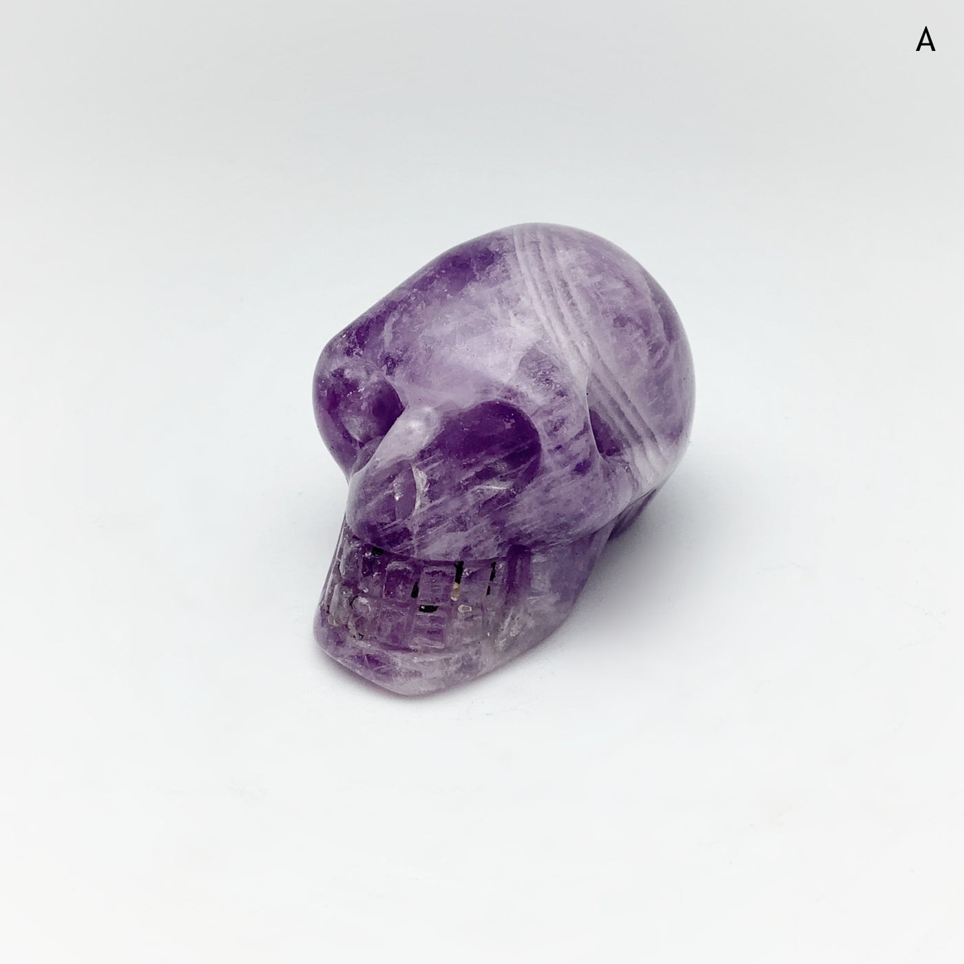 Carved Chevron Amethyst Skull at $49 Each