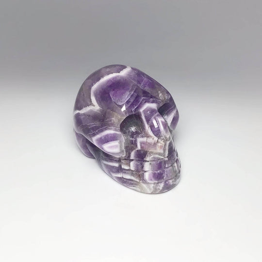 Carved Chevron Amethyst Crystal Skull - Rocks and Gems Canada