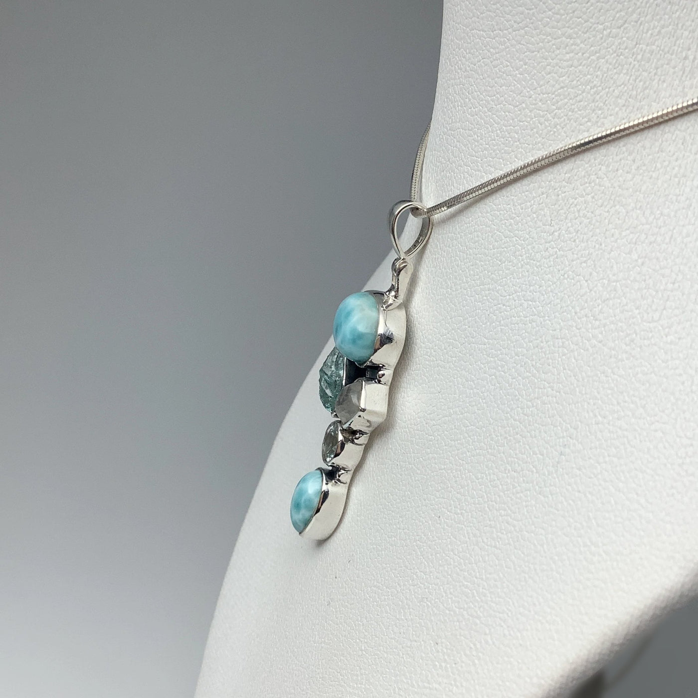 Larimar, Aquamarine, Rainbow Moonstone and Blue Topaz Pendant