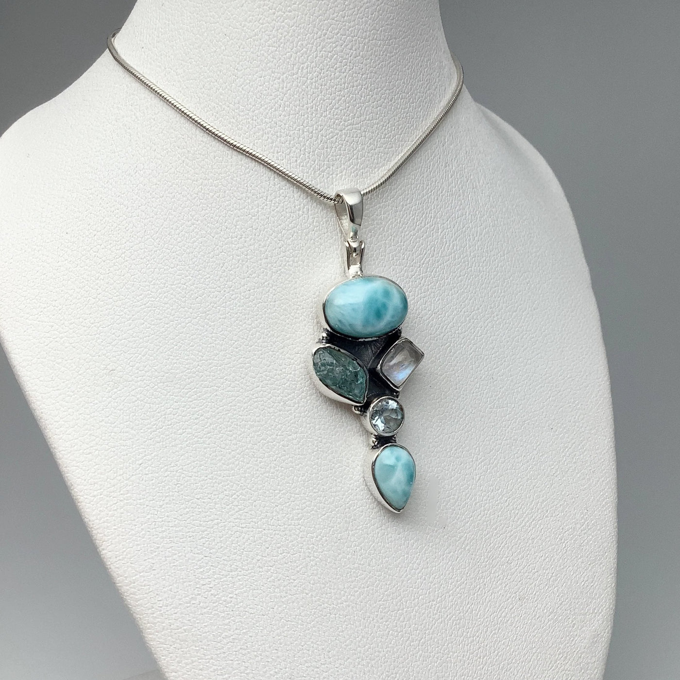 Larimar, Aquamarine, Rainbow Moonstone and Blue Topaz Pendant