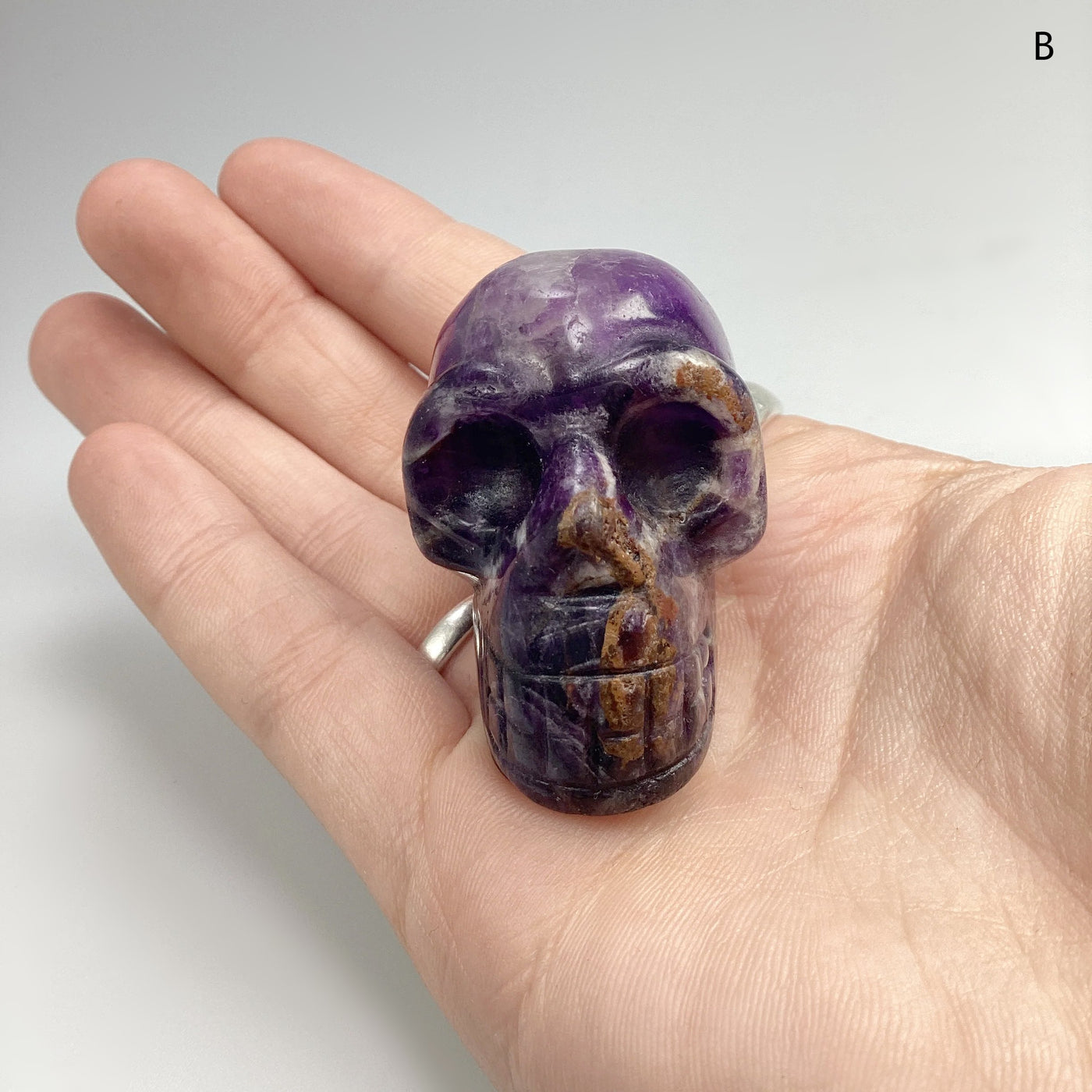 Carved Chevron Amethyst Skull at $69 Each
