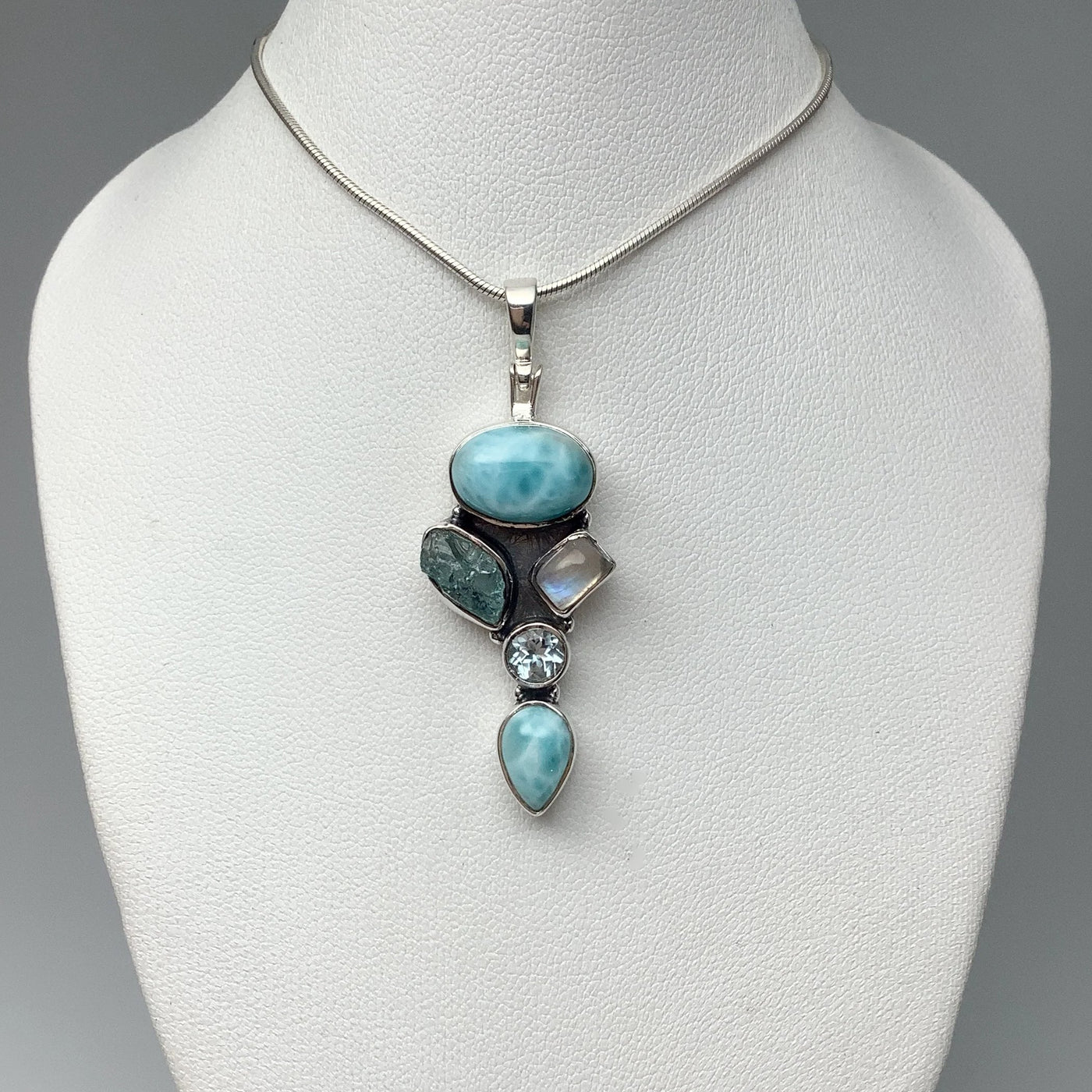 Larimar, Aquamarine, Rainbow Moonstone and Blue Topaz Pendant