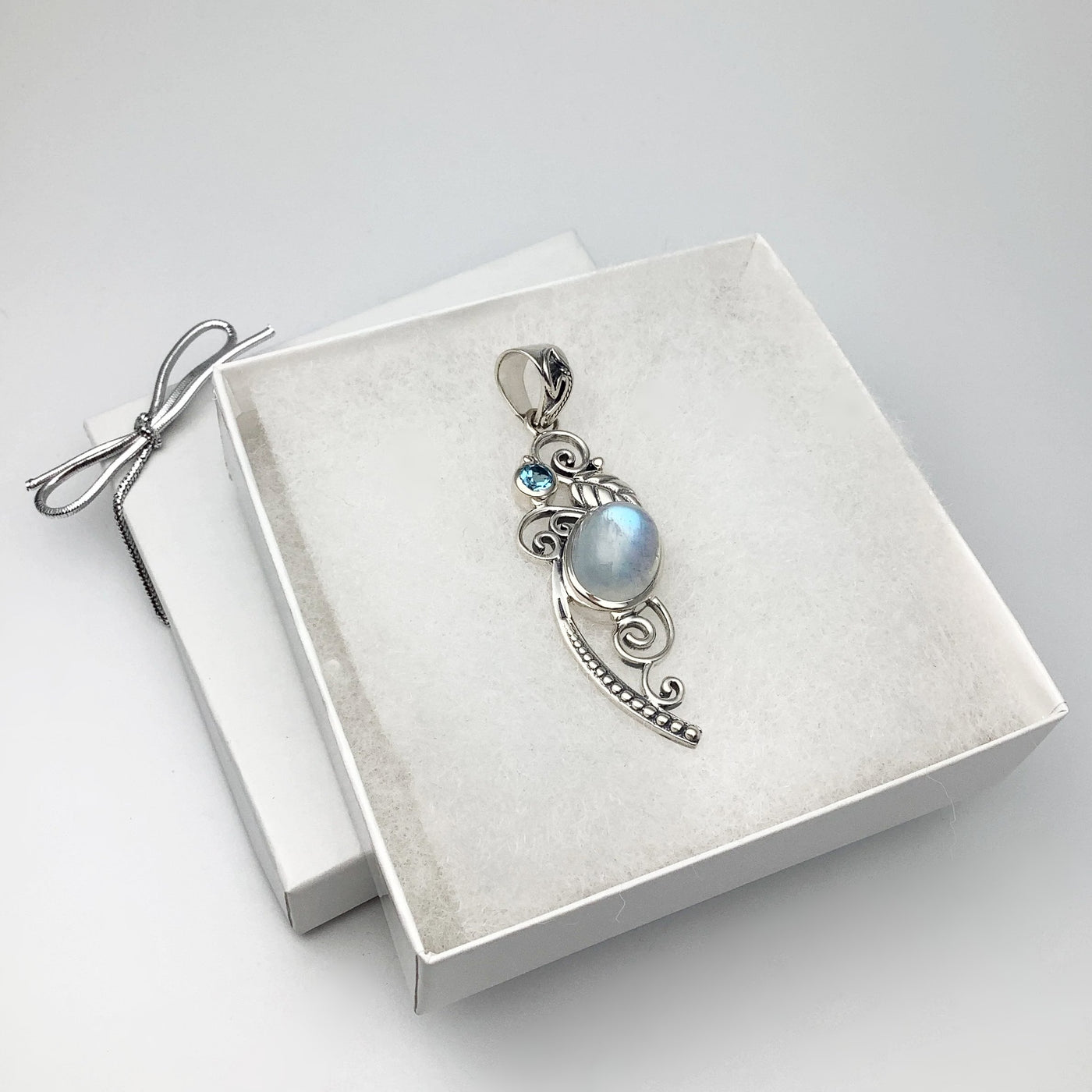 Rainbow Moonstone and Blue Topaz Pendant