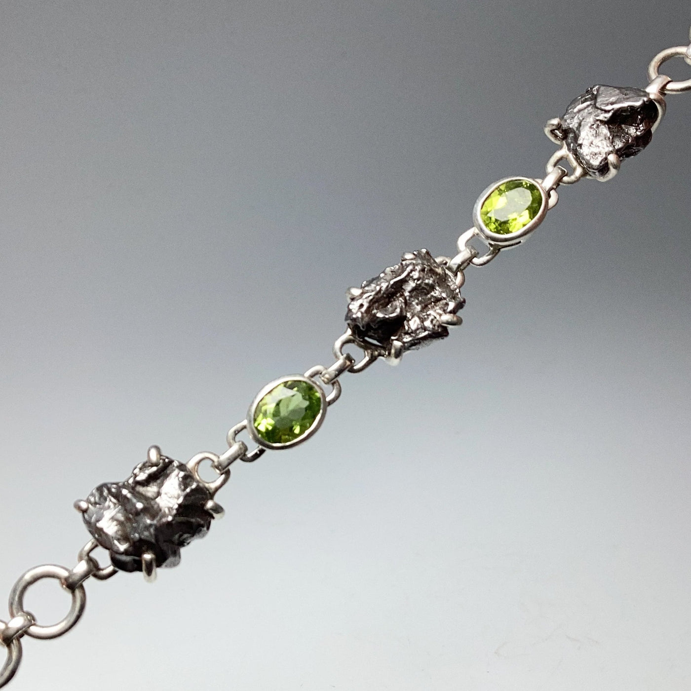 Campo Del Cielo Meteorite and Faceted Peridot Sterling Silver Bracelet