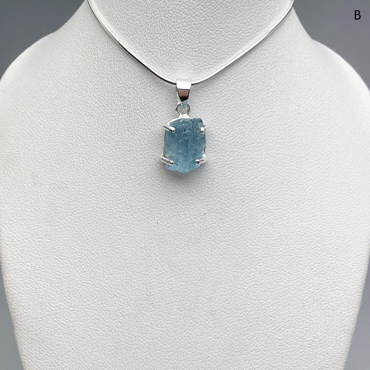 Raw Aquamarine Pendant at $125