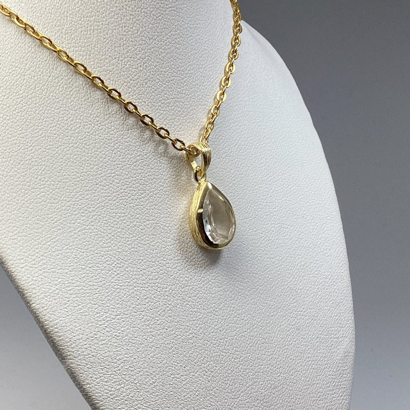 Clear Quartz Gold Finish Pendant