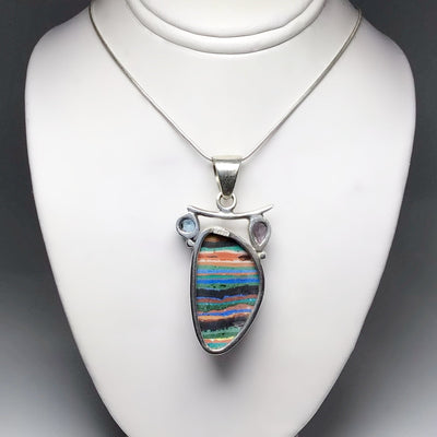 Rainbow Calcite, Blue Topaz and Amethyst Pendant