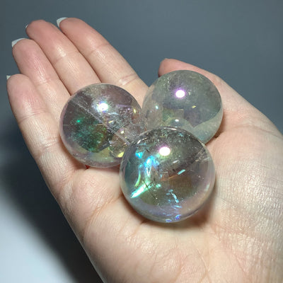 Opalescent Aura Quartz Sphere at $89 Each
