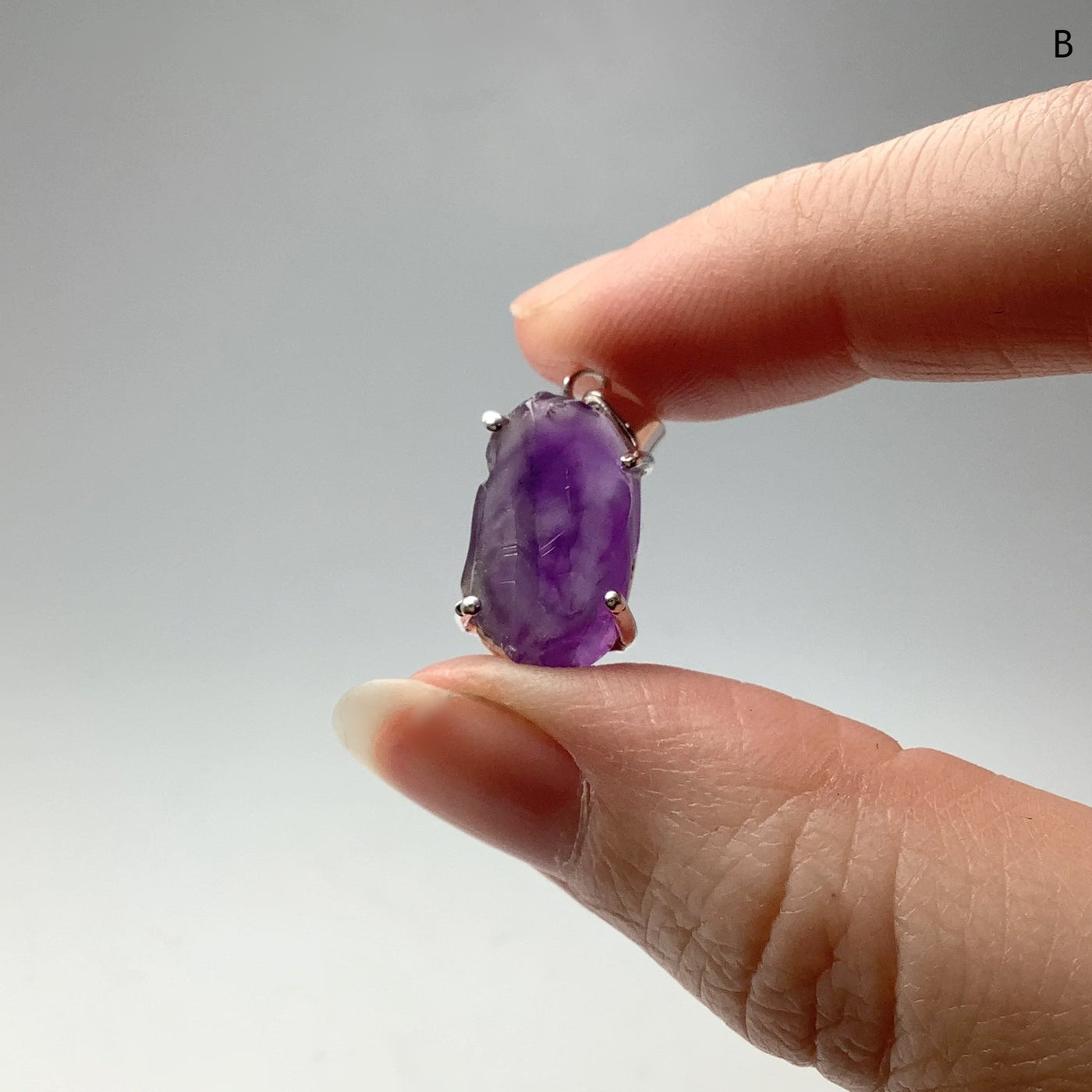 Raw Amethyst Pendant at $125 Each