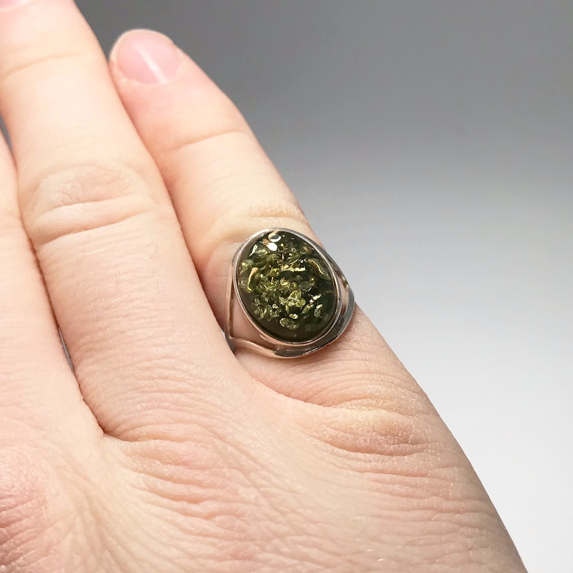 Green amber ring on sale