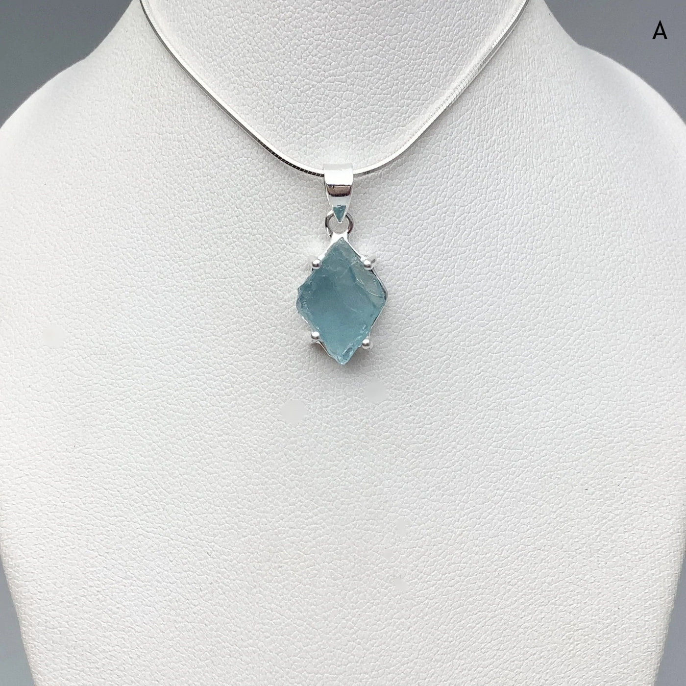Raw Aquamarine Pendant at $125