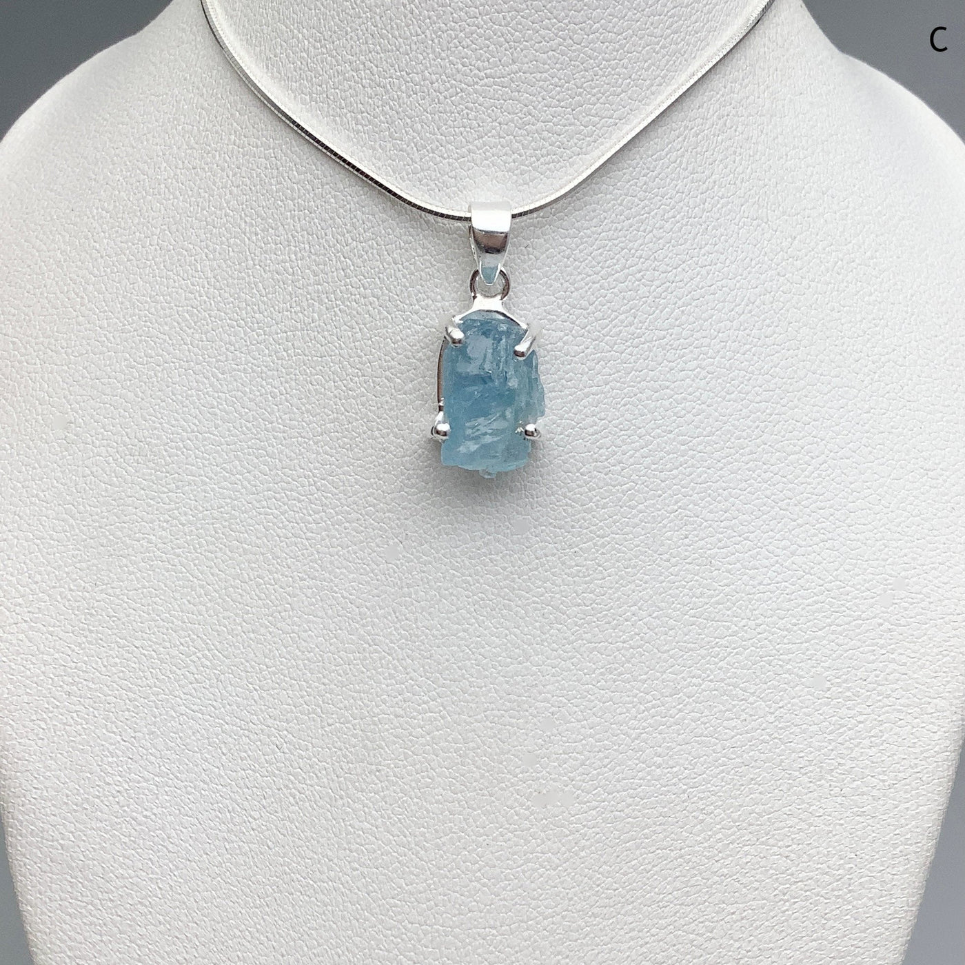 Raw Aquamarine Pendant at $125