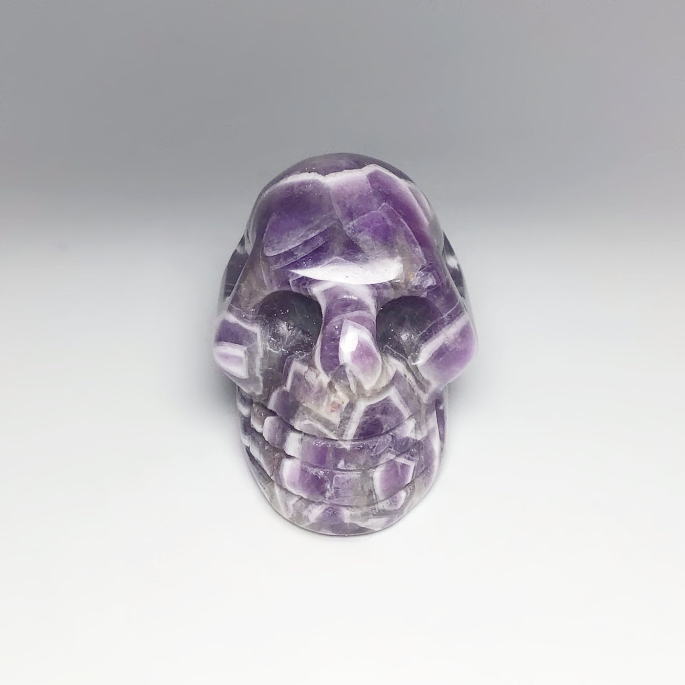 Carved Chevron Amethyst Crystal Skull