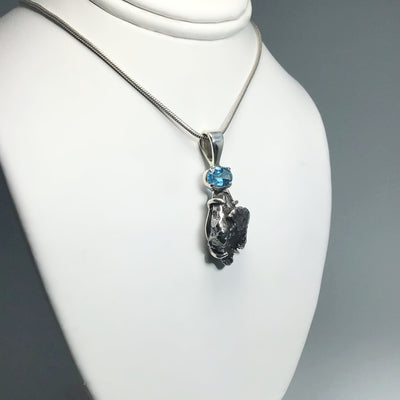 Campo Del Cielo Meteorite and Faceted Blue Topaz Pendant