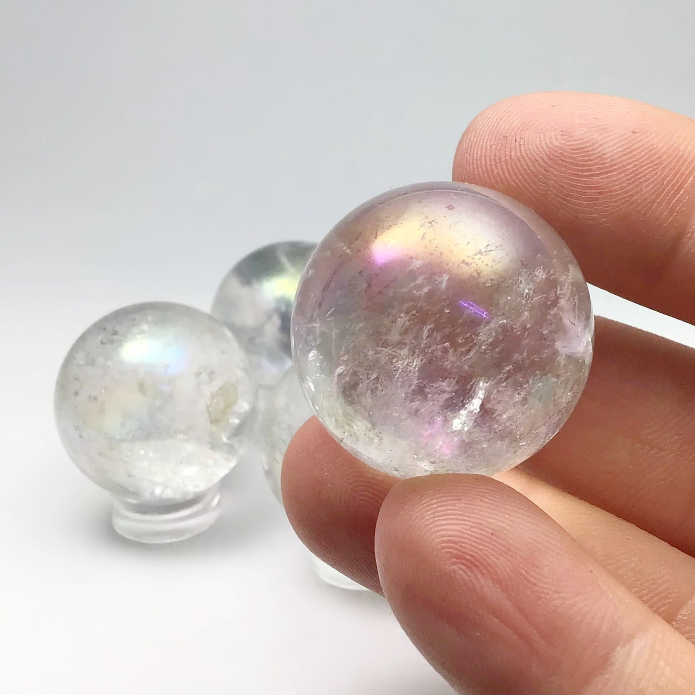 Opalescent Aura Quartz Sphere at $55 Each