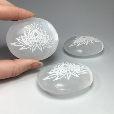 Selenite Palm Stone with Lotus Flower Engraving