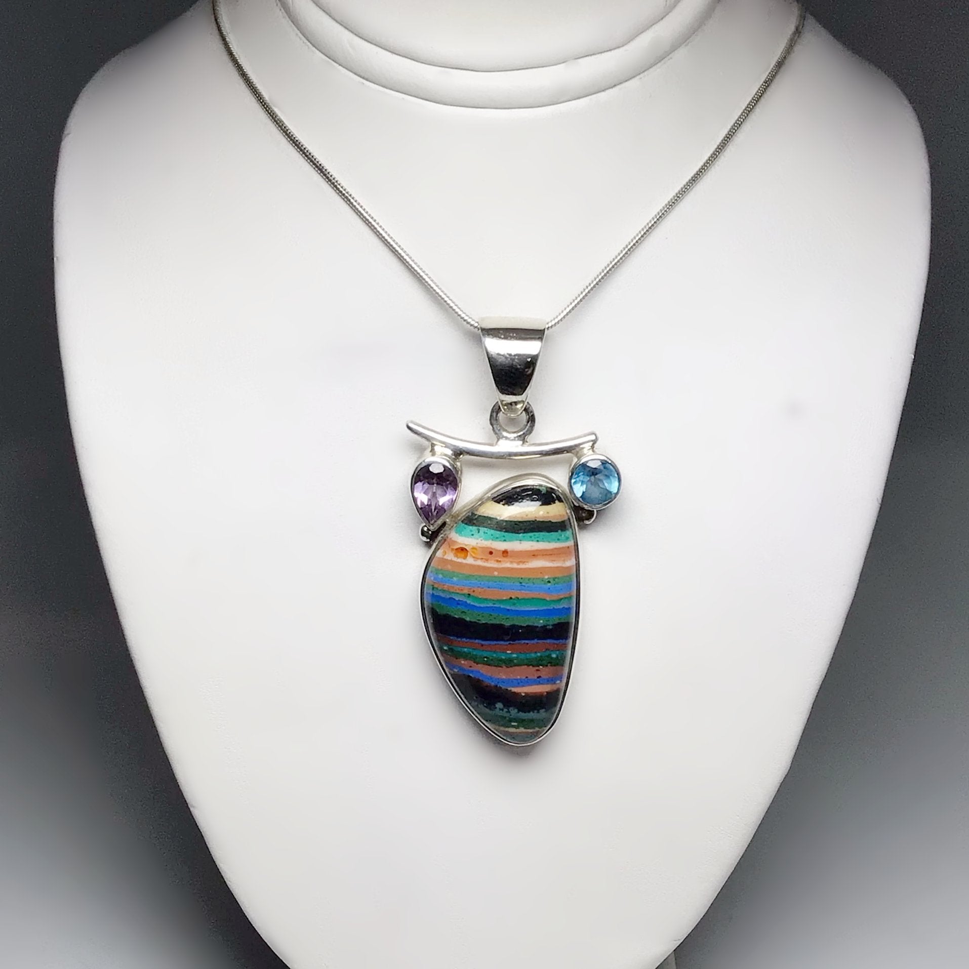 Rainbow Calcite, Blue Topaz and Amethyst Pendant - Rocks and Gems Canada