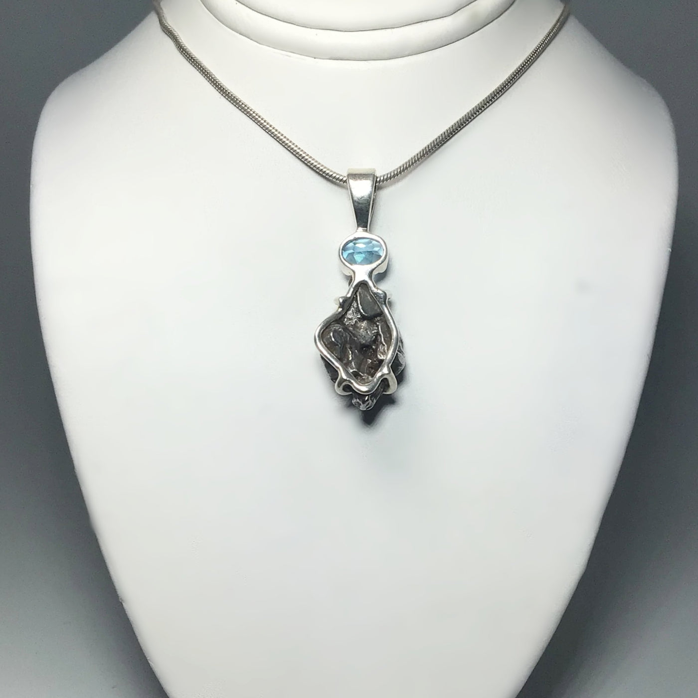 Campo Del Cielo Meteorite and Faceted Blue Topaz Pendant