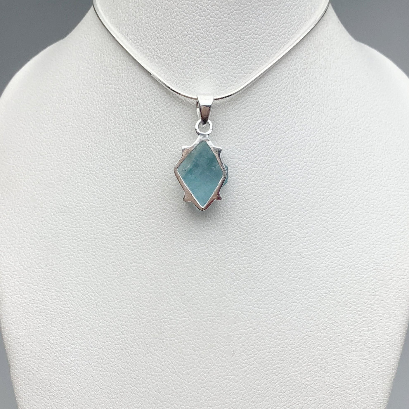Raw Aquamarine Pendant at $125
