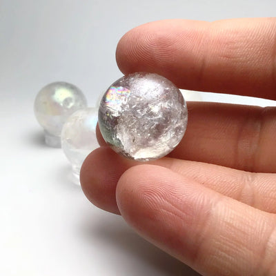 Mini Opalescent Aura Quartz Sphere at $35 Each