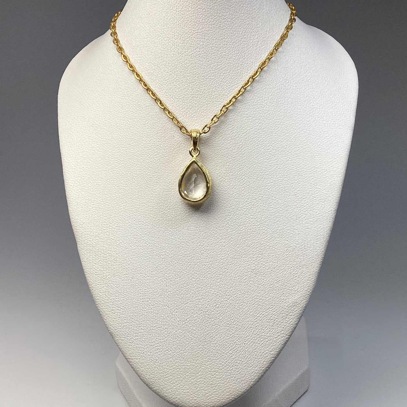 Clear Quartz Gold Finish Pendant
