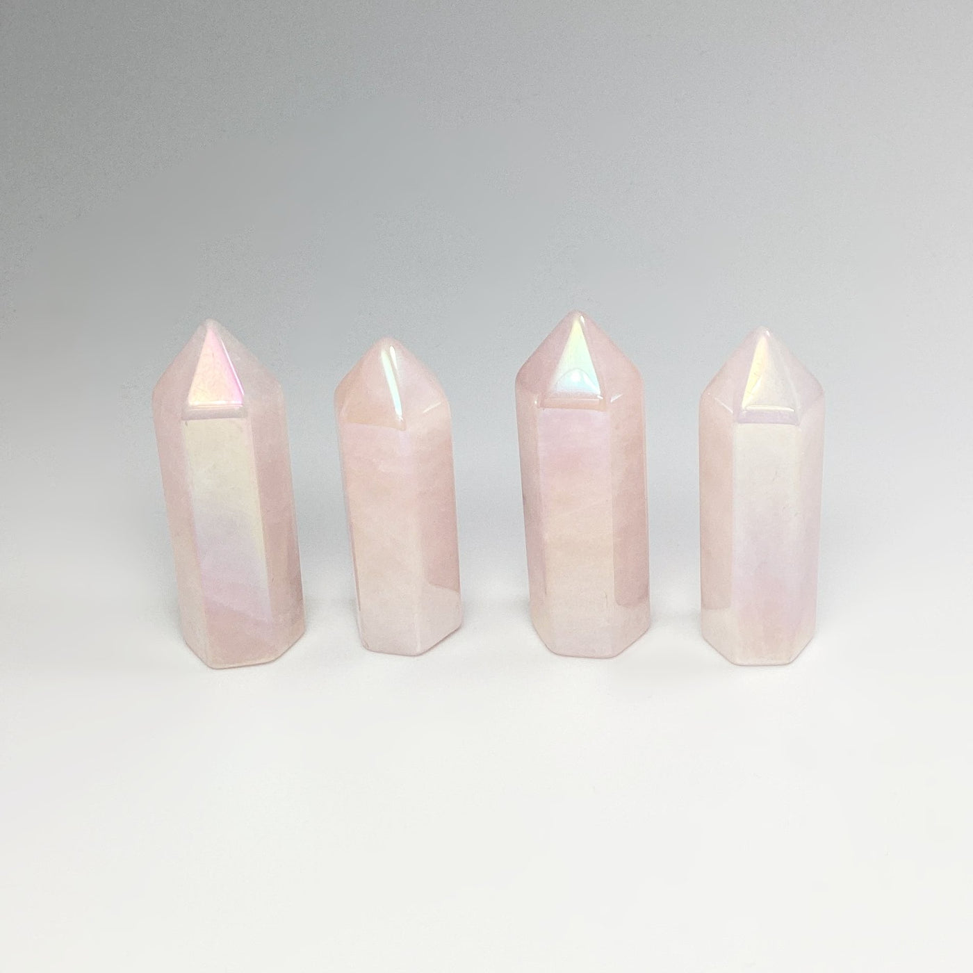 Polished Opalescent Rose Quartz Point at $39 Each