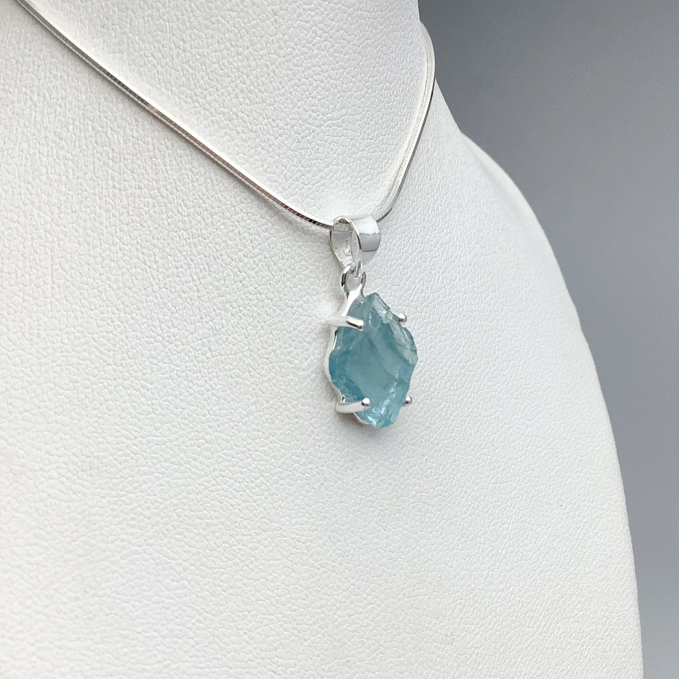 Raw Aquamarine Pendant at $125