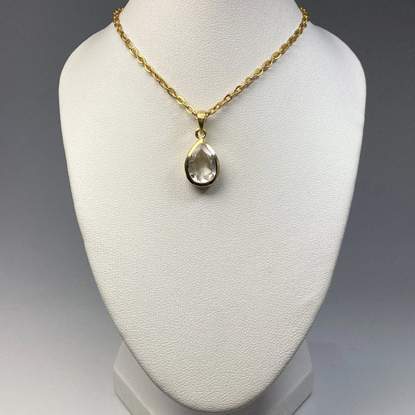 Clear Quartz Gold Finish Pendant